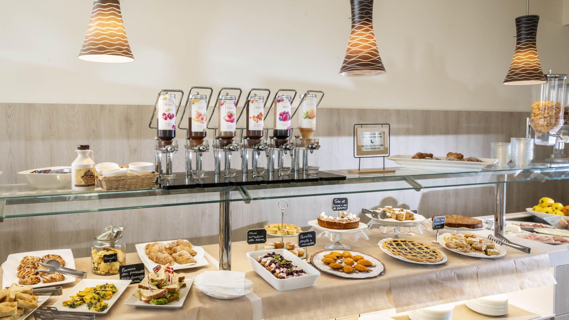 Inviting, colorful buffet with sweets and drinks.