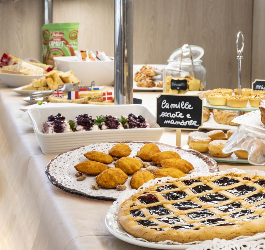 Dessert buffet: pies, cakes, cookies, a visual and olfactory delight.
